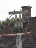 Biddenden town sign, with the famous conjoined twins, the Maids of Biddenden